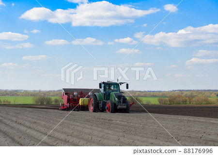 planting a potato 88176996