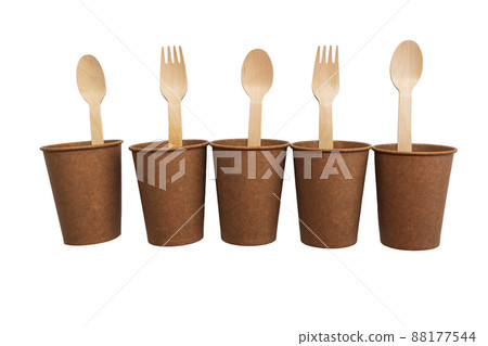 Eco brown cups on a white background. Mockup for your and copy space Eco brown cups on a white background. Mockup for your and copy space 88177544