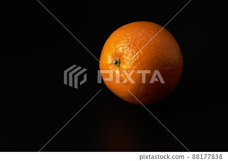Orange on a black background. Vegan and vegetarian food 88177838