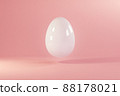 Easter white egg flying on pink background. Minimal easter concept. Happy Easter card with copy space for text. Levitating egg. 88178021