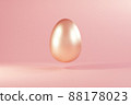 Easter golden glitter egg flying on pink background. Minimal easter concept. Happy Easter card with copy space for text. Levitating egg. 88178023