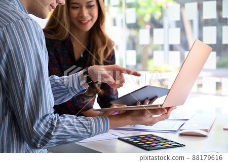 Team of graphic designer planning application process development prototype wireframe for web mobile phone. User experience concept. Team of graphic designer planning application process development prototype wireframe for web mobile phone. User experience concept. 88179616