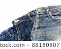 stack of blue jeans isolated	 88180807
