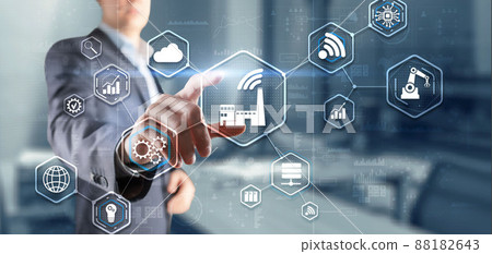 Businessman presses Smart Industry on virtual screen Businessman presses Smart Industry on virtual screen 88182643