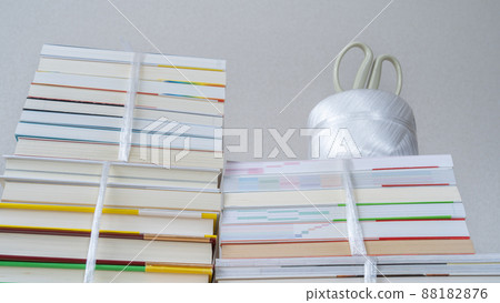 Image of collecting unnecessary books | Tie books with strings Image of collecting unnecessary books | Tie books with strings 88182876