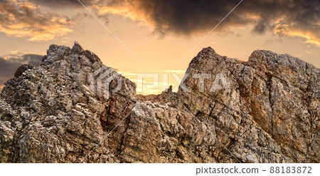 summit of Zugspitze in the german alps with dark evenibg clouds summit of Zugspitze in the german alps with dark evenibg clouds 88183872