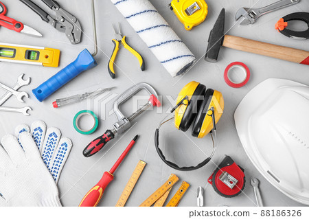 Flat lay composition with construction tools on light grey background 88186326