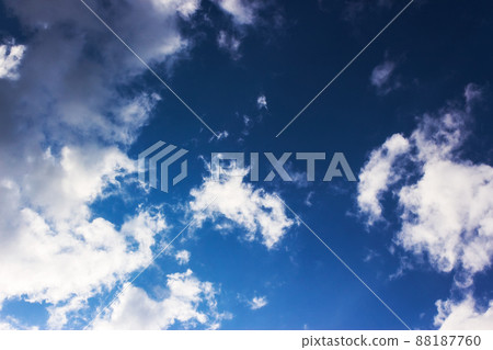 Blue sky background. beautiful abstract natural backdrop. wallpaper with fluffy clouds in bright morning light. fresh air concept Blue sky background. beautiful abstract natural backdrop. wallpaper with fluffy clouds in bright morning light. fresh air concept 88187760
