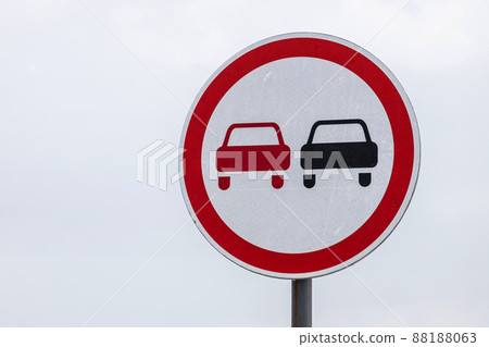 Round road sign 'No passing' isolated on white 88188063