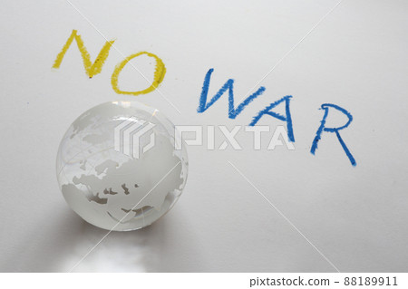 Glass globe and text of "NO W" anti-war image Glass globe and text of "NO W" anti-war image 88189911
