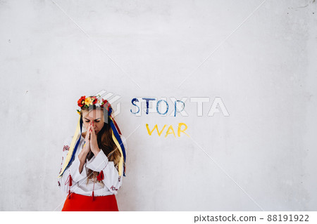 Ukrainian girl sad crying war in Ukraine. Stop war. Ukrainian girl sad crying war in Ukraine. Stop war. 88191922