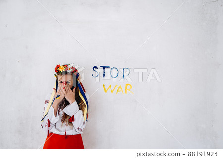 Ukrainian girl sad crying war in Ukraine. Stop war. Ukrainian girl sad crying war in Ukraine. Stop war. 88191923