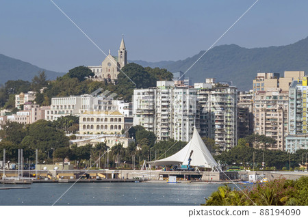Sunny view of the Chapel of Our Lady of Penha and cityscape 88194090