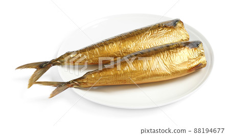 Plate with smoked fish isolated on white Plate with smoked fish isolated on white 88194677