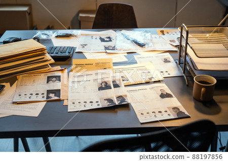 Workplace of fbi agent with criminal profiles, evidences and clues 88197856