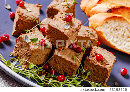 liver pate cubes on plate with toast and berries 88198226