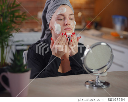 woman Enjoying flawless skin . 88198264