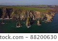 huge rocks and cliffs in the middle of the Atlantic Ocean in a UNESCO protected geopark, Stradbally Cove, on the Cooper Coast, Waterford, Ireland. 88200630