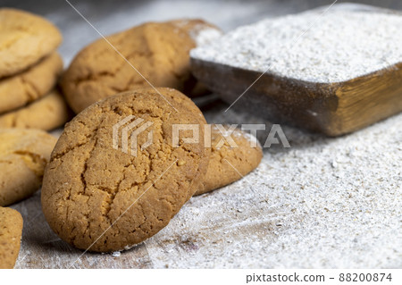 several round light cookies after cooking several round light cookies after cooking 88200874