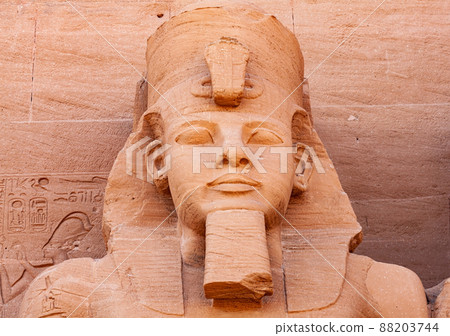 Statue of Pharaoh Ramses II in front of The Great Temple of Ramses II in the village of Abu Simbel. 88203744