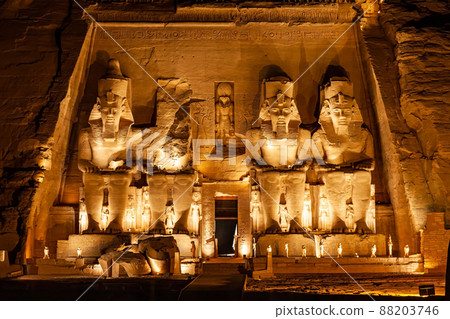 Statue of Pharaoh Ramses II in front of The Great Temple of Ramses II in Abu Simbel in the night. 88203746