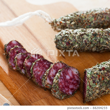 Catalan sausage fuet in herbs 88204233