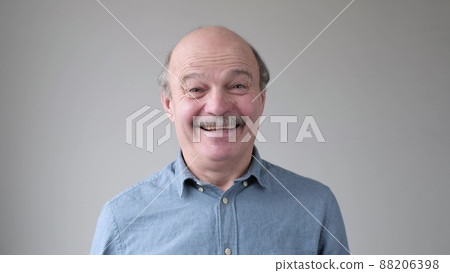 Smiling mature casual hispanic man at camera. Smiling mature casual hispanic man at camera. 88206398