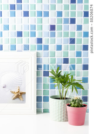Photo frames, tile walls and foliage plants 88206874