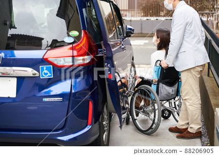 Women and men on wheelchairs 88206905