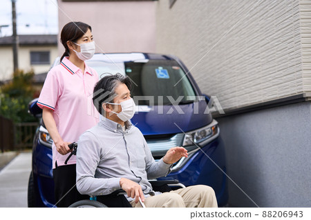 Men and women on wheelchairs Men and women on wheelchairs 88206943