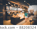 Blur Coffee Cafe Shop and Bokeh Light Bulb Background. Defocused Image and Blur Customer People in Coffee Counter Shop. Blur Cafe Store Shop Lifestyles and Client Service Food Event 88208324