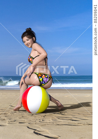A woman with bun hair wearing a colorful vivid color floral bikini on a sandy beach near the rippling sea is a beach ball 88209841