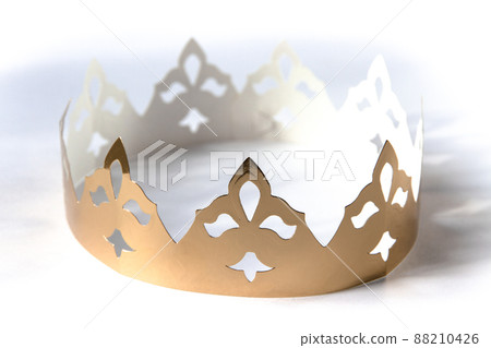 Gold paper king crown isolated on white Gold paper king crown isolated on white 88210426