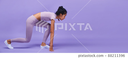 Full length of Asian slim tanned skin Fitness woman hands touch ground floor ready to start to run Full length of Asian slim tanned skin Fitness woman hands touch ground floor ready to start to run 88211396