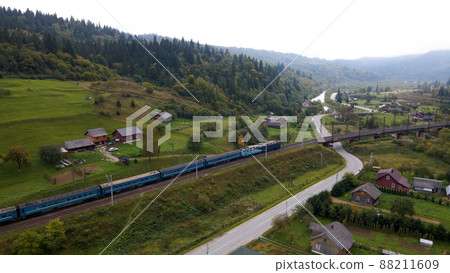 The train goes in the mountains. Ukraine The train goes in the mountains. Ukraine 88211609