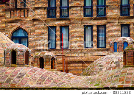 Shabby domes against brick building Shabby domes against brick building 88211828