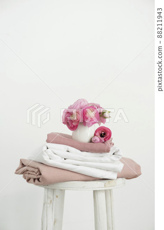 Linen pink and white fabric and pink flowers 88211943