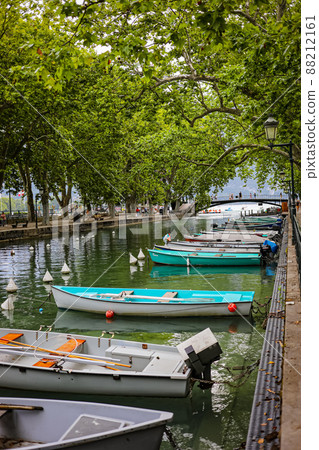 A boat floating on the canal of Annecy, France A boat floating on the canal of Annecy, France 88212161