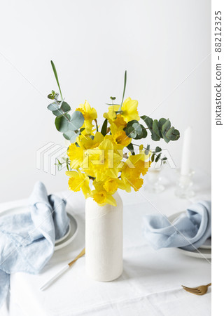 Easter table with flowers Easter table with flowers 88212325