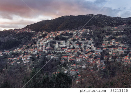 Greek village with traditional houses panoramic mountain view. Greek village with traditional houses panoramic mountain view. 88215126