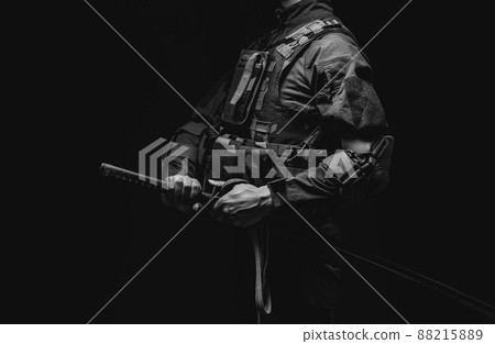 Soldier holding a Japanese sword 88215889