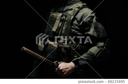 Soldier holding a Japanese sword Soldier holding a Japanese sword 88215895