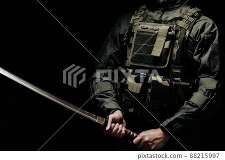 Soldier holding a Japanese sword Soldier holding a Japanese sword 88215997