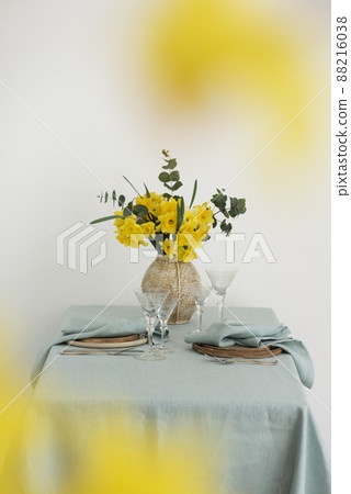 Concept of romanitic Easter table with flowers Concept of romanitic Easter table with flowers 88216038