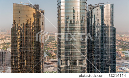 Tall residential buildings at JLT aerial timelapse, part of the Dubai multi commodities centre mixed-use district. Tall residential buildings at JLT aerial timelapse, part of the Dubai multi commodities centre mixed-use district. 88216154