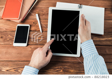 businessman with a tablet, works in the office 88218023