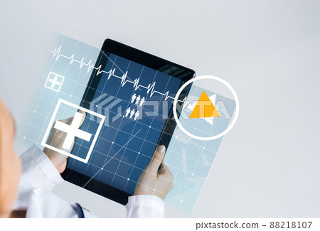 Close of female doctor hands working with tablet pc computer 88218107