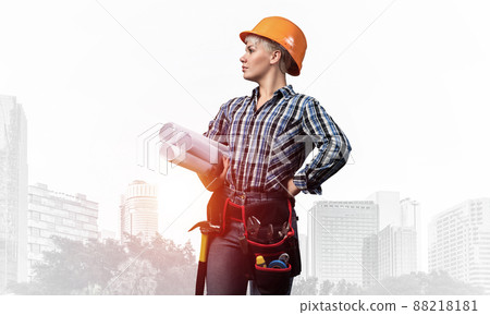 Attractive female engineer in hardhat Attractive female engineer in hardhat 88218181