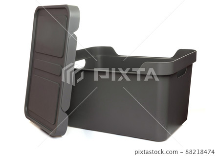 gray plastic storage box with lid and handles on a white isolated background gray plastic storage box with lid and handles on a white isolated background 88218474