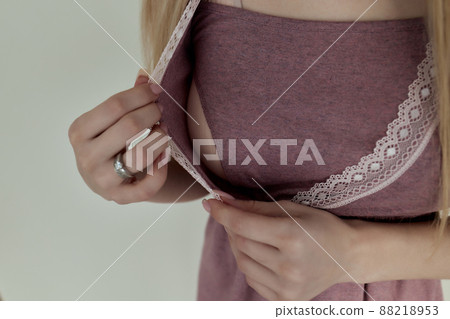 lothing design for breastfeeding. Happy pregnancy and maternity. Fashion style for young mothers. Clothes with a secret zipper for feeding the baby. lothing design for breastfeeding. Happy pregnancy and maternity. Fashion style for young mothers. Clothes with a secret zipper for feeding the baby. 88218953